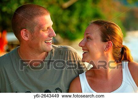 Smiling young couple Teluk Nipah beach Pulau Pangkor island Malaysia. View Large Photo Image Stock Photo - Smiling young couple Teluk Nipah beach Pulau Pangkor island Malaysia.. Fotosearch