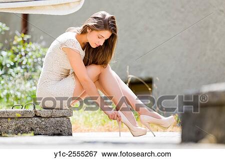 Stock Photo - Stock Photo - Beautiful young lady on high heels low view. Fotosearch