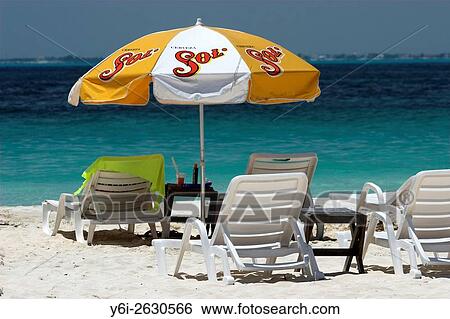 Sun beds and umbrella Playa Sol Isla Mujeres Mexico. View Large Photo Image Stock Photograph - Sun beds and umbrella Playa Sol Isla Mujeres Mexico.. Fotosearch