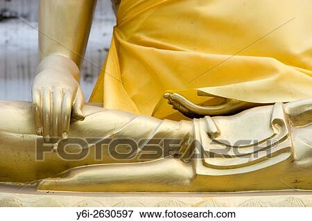 Stock Photo - Symbolic golden hands of Buddha temple Chiang Mai Thailand.. Fotosearch