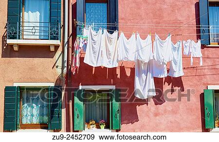 Washing hanging in front of house, Murano island, Venetian Lagoon, Veneto, Italy, Europe. View Large Photo Image Stock Photo - Washing hanging in front of house, Murano island, Venetian Lagoon, Veneto, Italy, Europe.. Fotosearch