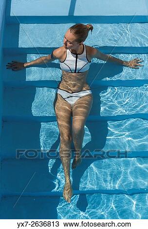 Woman in swimming pool. View Large Photo Image Stock Image - Woman in swimming pool.. Fotosearch