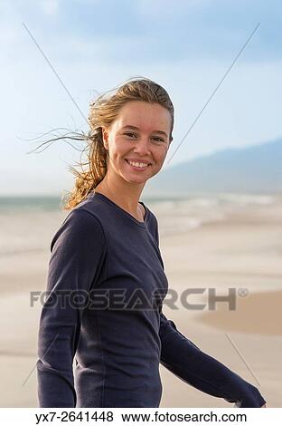 Young blond teenager at the beach. View Large Photo Image Stock Photo - Young blond teenager at the beach.. Fotosearch