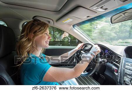 Young teenage girl age 16 with Dad in passanger seat as she drives car for the first time MR model released. View Large Photo Image Stock Photograph - Young teenage girl age 16 with Dad in passanger seat as she drives car for the first time MR model released.. Fotosearch