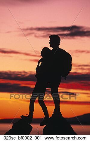 Couple Turnagain Arm Hiking Sunset Silhouette Ak Southcentral Chugach State Park Summer Stock Image 0sc Bf0002 001 Fotosearch