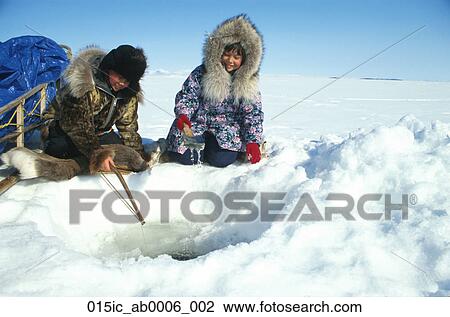 Natives Ice Fishing In Kotzebue Western Alaska Winter Stock Image 