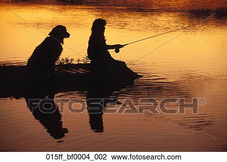 Download Woman and Dog Six-Mile Lake Flyfishing Silhouette AK ...