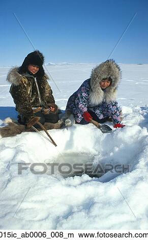 Stock Photo of Natives Ice fishing in Kotzebue Western Alaska winter ...