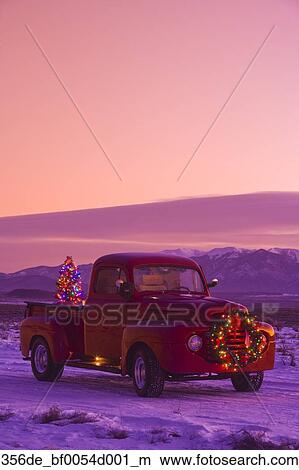 Vintage Red Ford Pick Up Truck With Christmas Wreath On The