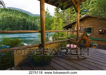 Rustic Cabin Porch With Chair At Alaska River S Company In Cooper