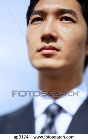 Stock Image - Businessman, head shot. Fotosearch