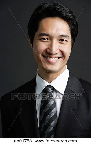 Businessman, looking at camera, head shot View Large Photo Image Stock Photo - Businessman, looking at camera, head shot. Fotosearch