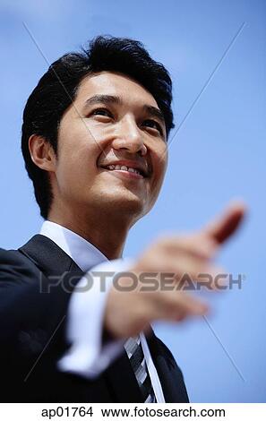 Picture - Businessman offering hand for handshake, selective focus. Fotosearch