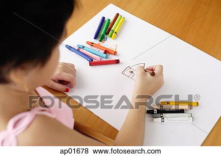Girl drawing on paper, over the shoulder view View Large Photo Image Stock Photo - Girl drawing on paper, over the shoulder view. Fotosearch