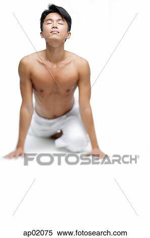 Stock Photography - Man doing yoga. Fotosearch