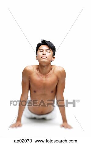 Man in yoga position doing cobra pose View Large Photo Image Stock Image - Man in yoga position doing cobra pose. Fotosearch