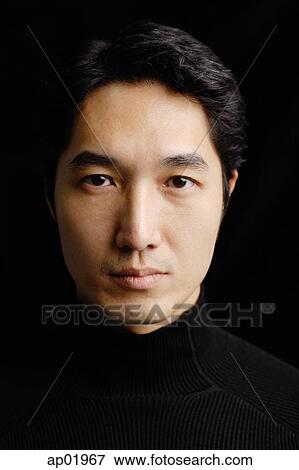 Man looking at camera, head shot View Large Photo Image Stock Photo - Man looking at camera, head shot. Fotosearch