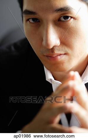 Man looking at camera, selective focus View Large Photo Image Stock Photograph - Man looking at camera, selective focus. Fotosearch