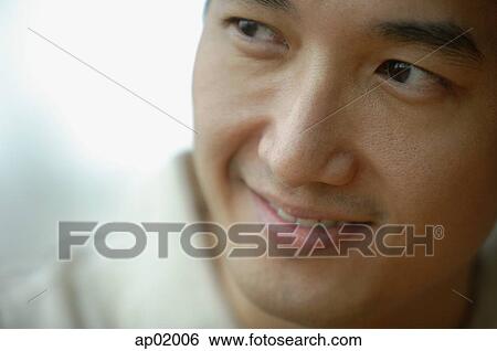 Stock Photograph - Man looking away, head shot, portrait. Fotosearch
