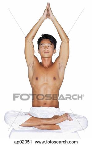 Stock Image - Man practicing yoga. Fotosearch