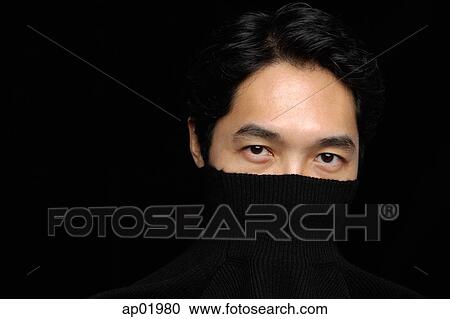 Man with turtleneck over face, looking at camera View Large Photo Image Stock Image - Man with turtleneck over face, looking at camera. Fotosearch