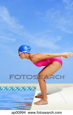 Woman in swimming costume, bending, preparing to dive View Large Photo Image Picture - Woman in swimming costume, bending, preparing to dive. Fotosearch