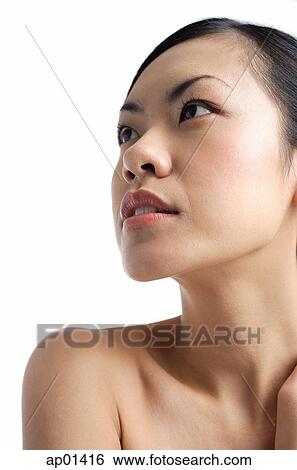 Stock Photograph - Woman looking away, portrait. Fotosearch