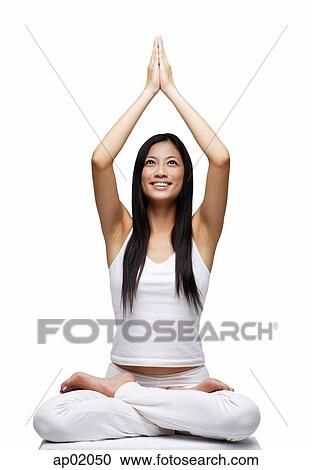 Woman practicing yoga, smiling View Large Photo Image Stock Image - Woman practicing yoga, smiling. Fotosearch