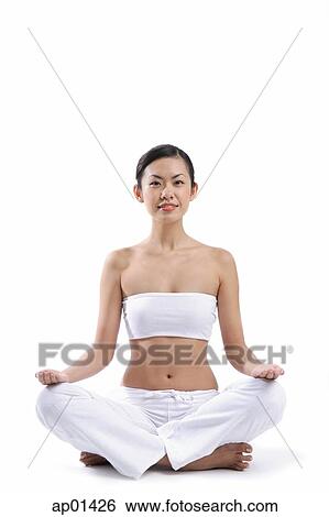Woman sitting on floor, legs crossed View Large Photo Image Stock Photograph - Woman sitting on floor, legs crossed. Fotosearch