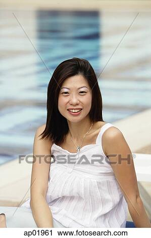 Woman smiling at camera View Large Photo Image Stock Image - Woman smiling at camera. Fotosearch