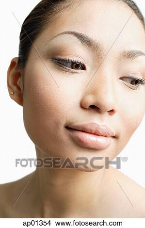 Young woman looking away View Large Photo Image Picture - Young woman looking away. Fotosearch