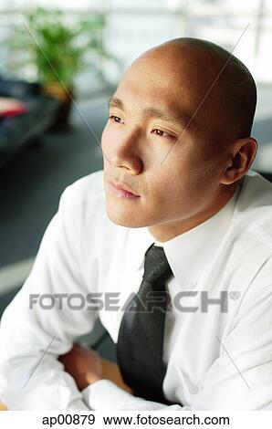 Bald executive, looking away View Large Photo Image Stock Photo - Bald executive, looking away. Fotosearch