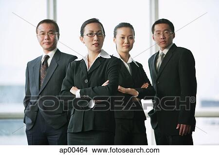Picture - Executives looking at camera. Fotosearch