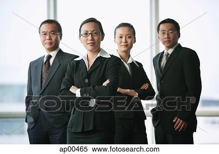 Executives looking at camera, portrait View Large Photo Image Stock Photography - Executives looking at camera, portrait. Fotosearch