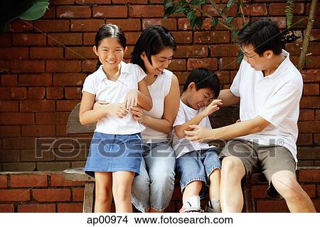 Picture - Family with two children, portrait. Fotosearch