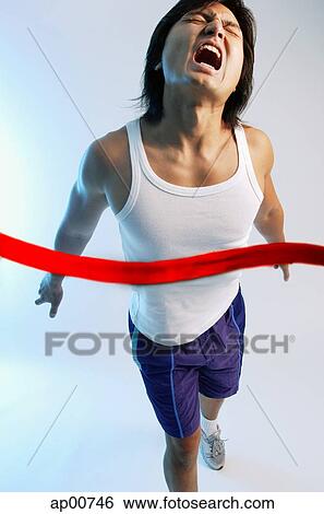 Man crossing finish line View Large Photo Image Stock Photograph - Man crossing finish line. Fotosearch