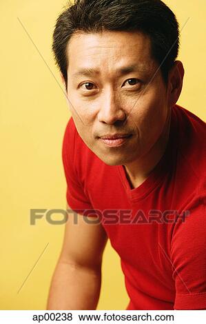 Stock Photo - Man looking at camera. Fotosearch