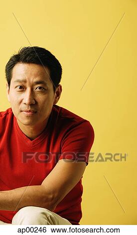 Stock Photograph - Man looking at camera. Fotosearch
