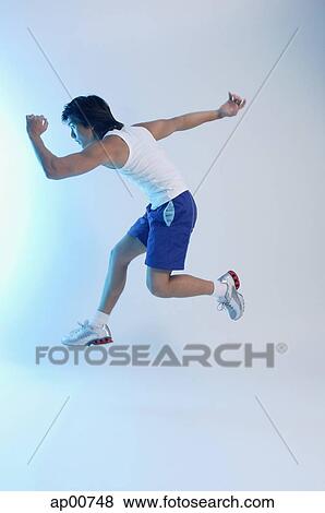 Man running and jumping View Large Photo Image Stock Photo - Man running and jumping. Fotosearch