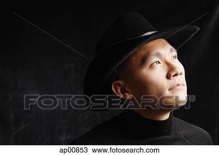 Man wearing hat, looking away View Large Photo Image Stock Image - Man wearing hat, looking away. Fotosearch