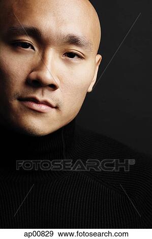 Man with shaved head, looking at camera, head shot View Large Photo Image Stock Photo - Man with shaved head, looking at camera, head shot. Fotosearch