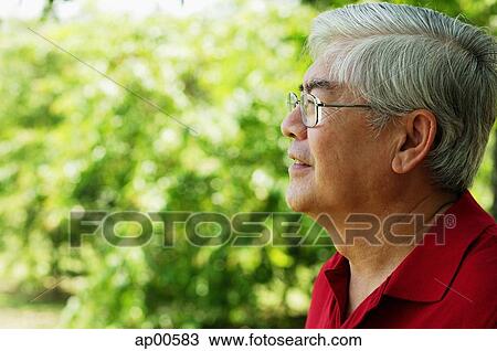 Mature man looking away View Large Photo Image Stock Image - Mature man looking away. Fotosearch