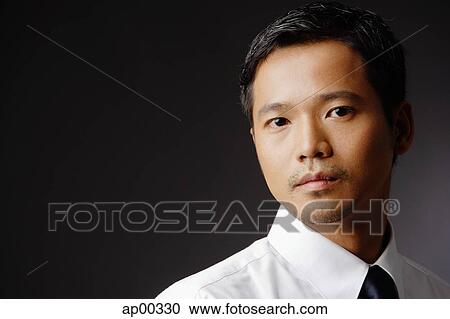 Stock Image - Portrait of an executive. Fotosearch
