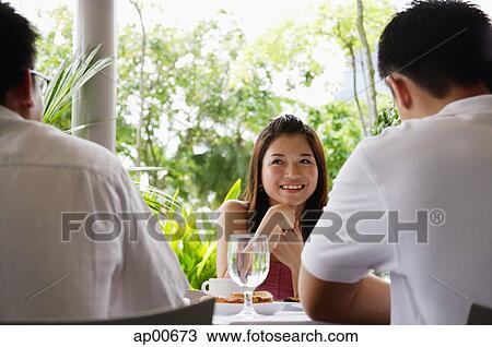 Portrait of woman smiling, over the shoulder view View Large Photo Image Stock Image - Portrait of woman smiling, over the shoulder view. Fotosearch