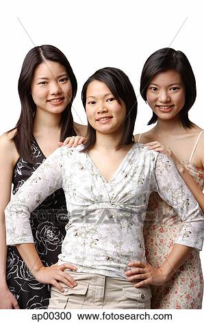 Three young women side by side, portrait View Large Photo Image Stock Image - Three young women side by side, portrait. Fotosearch