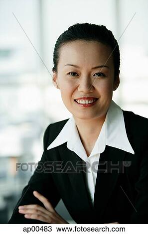 Stock Image - Woman in business suit, portrait. Fotosearch