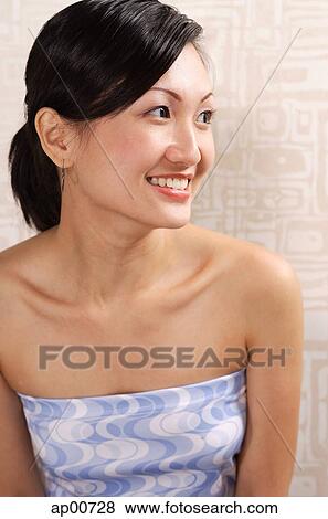 Woman in tube top, looking away View Large Photo Image Stock Photo - Woman in tube top, looking away. Fotosearch