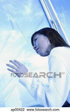 Woman leaning head on window, looking out View Large Photo Image Stock Image - Woman leaning head on window, looking out. Fotosearch