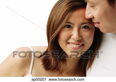 Woman leaning on man and looking at camera View Large Photo Image Stock Photo - Woman leaning on man and looking at camera. Fotosearch