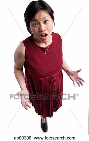 Woman looking at camera, mouth open View Large Photo Image Stock Photo - Woman looking at camera, mouth open. Fotosearch